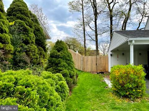 806 Chatfield Road Joppa, MD 21085 - Photo 4 of 28 Side yard leads to great back yard