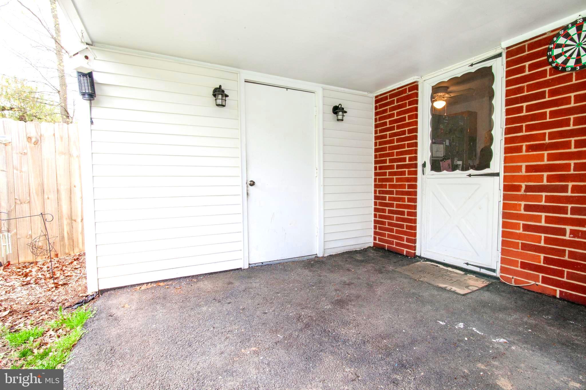 806 Chatfield Road Joppa, MD 21085 - Photo 5 of 28 Covered carport with locked storage shed