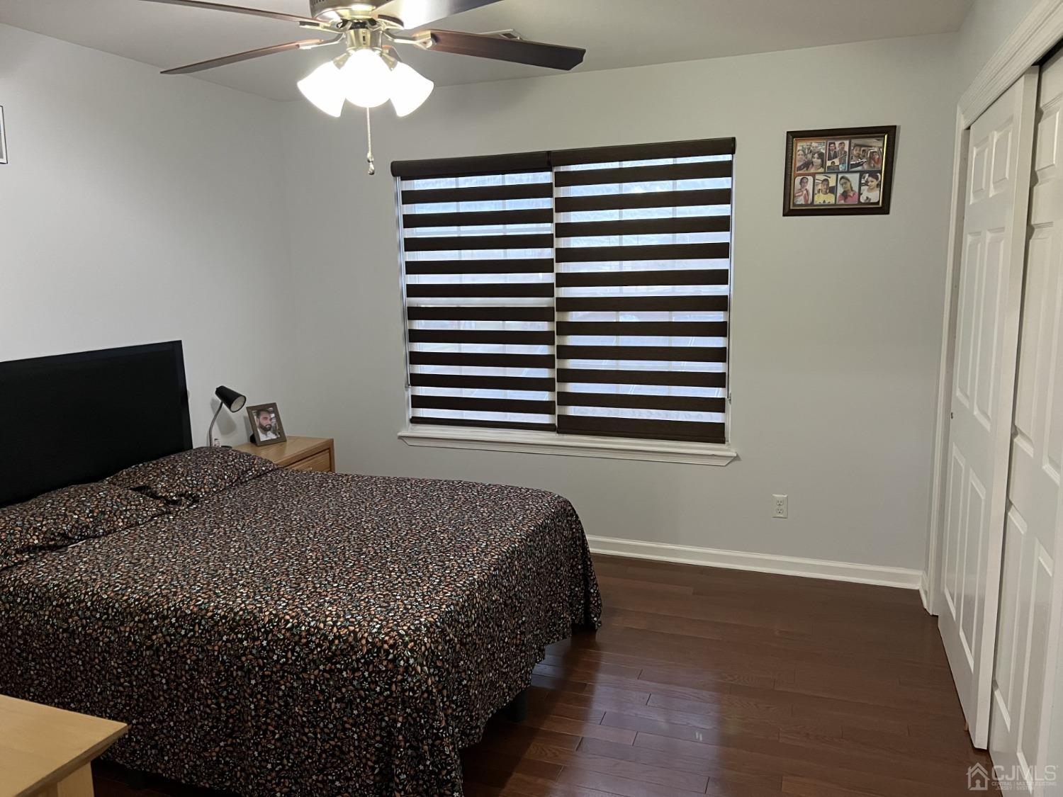 116 B Street Port Reading, NJ 07064 - Photo 13 of 30 a bedroom with a bed and a window