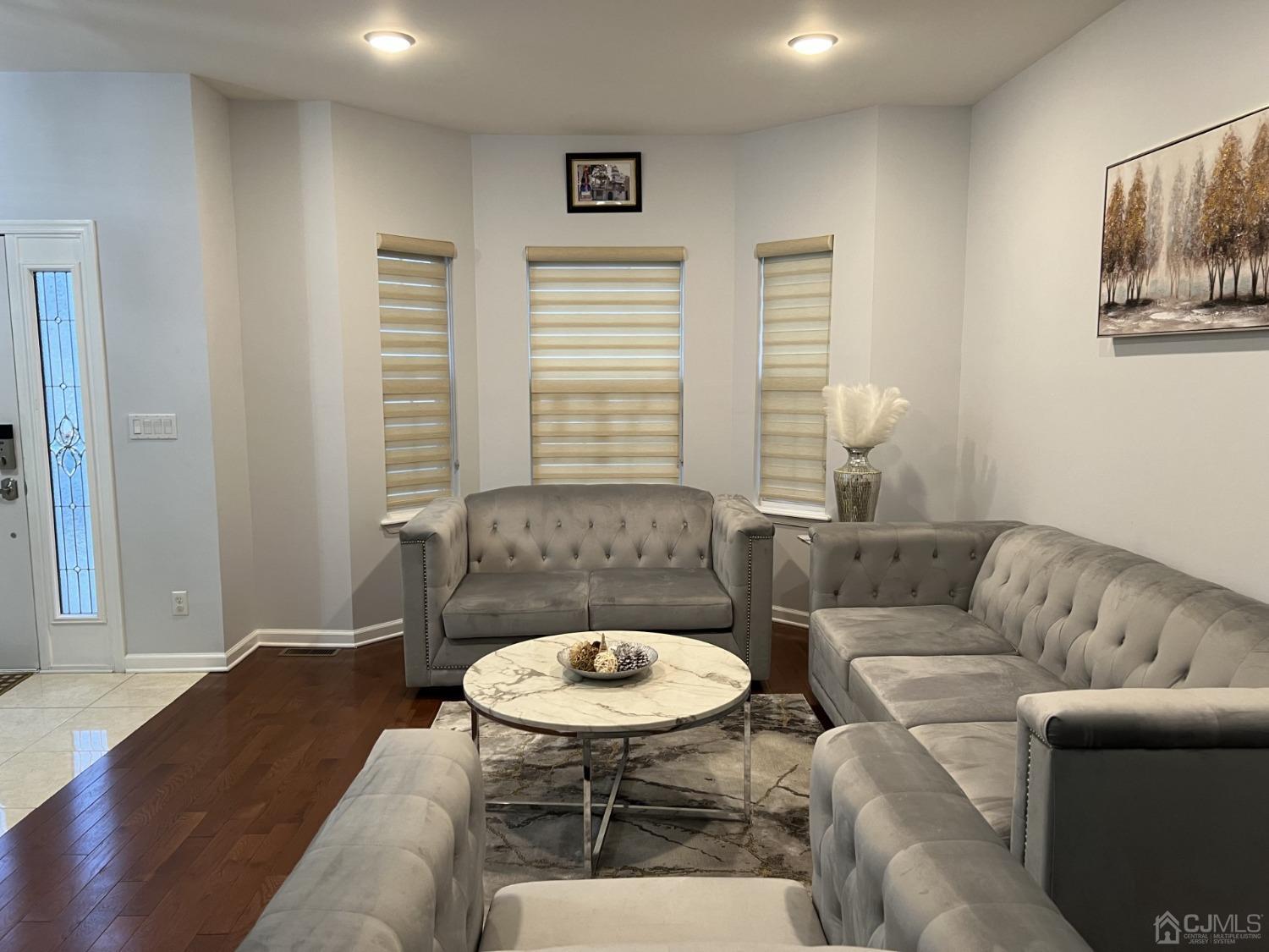 116 B Street Port Reading, NJ 07064 - Photo 4 of 30 a living room with furniture and a window