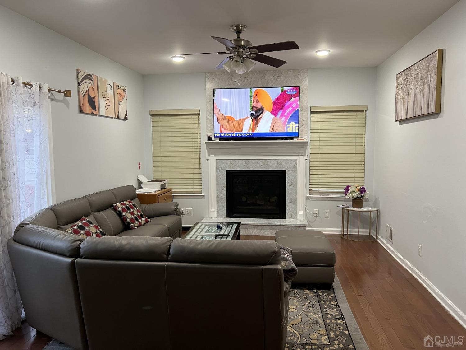 116 B Street Port Reading, NJ 07064 - Photo 7 of 30 a living room with furniture and a flat screen tv