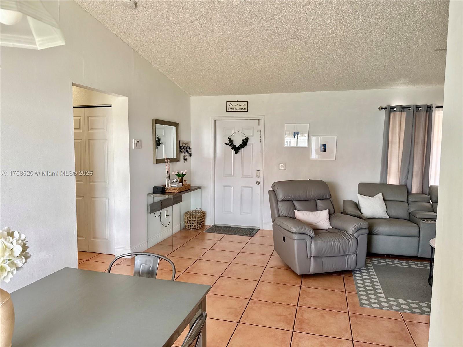 13065 Southwest 263rd Terrace Homestead, FL 33032 - Photo 11 of 19 a living room with furniture