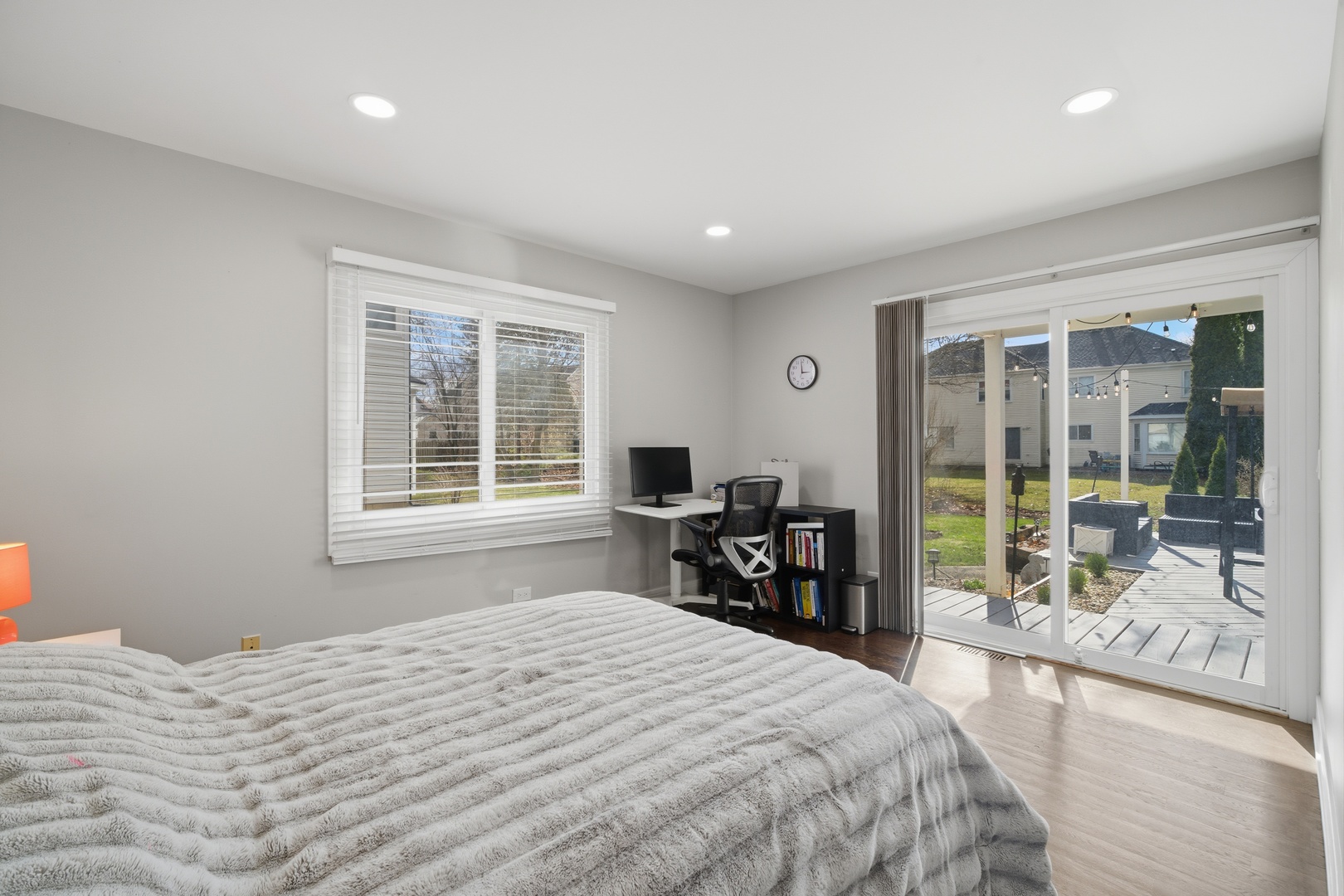 2936 Sandalwood Road Buffalo Grove, IL 60089 - Photo 15 of 40 a bedroom with a bed and large windows