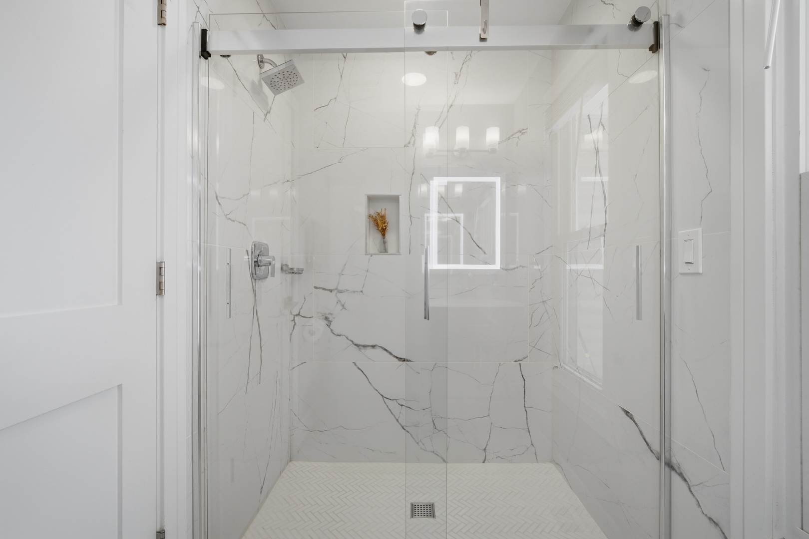 2936 Sandalwood Road Buffalo Grove, IL 60089 - Photo 17 of 40 a bathroom with a shower and a glass door