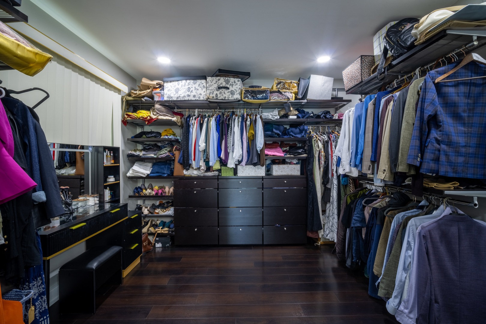 2936 Sandalwood Road Buffalo Grove, IL 60089 - Photo 21 of 40 a view of walk in closet with clothes and shoes