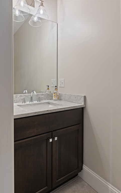 7 Jewell Crossing Mendon, MA 01756 - Photo 12 of 42 a bathroom with a sink vanity and a mirror