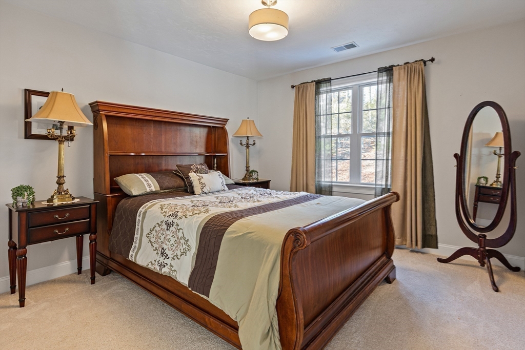 7 Jewell Crossing Mendon, MA 01756 - Photo 26 of 42 a bedroom with a bed and a window