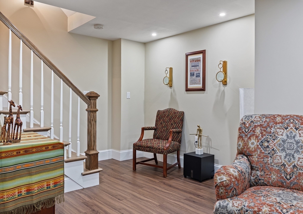 7 Jewell Crossing Mendon, MA 01756 - Photo 31 of 42 a living room with furniture and a wooden floor