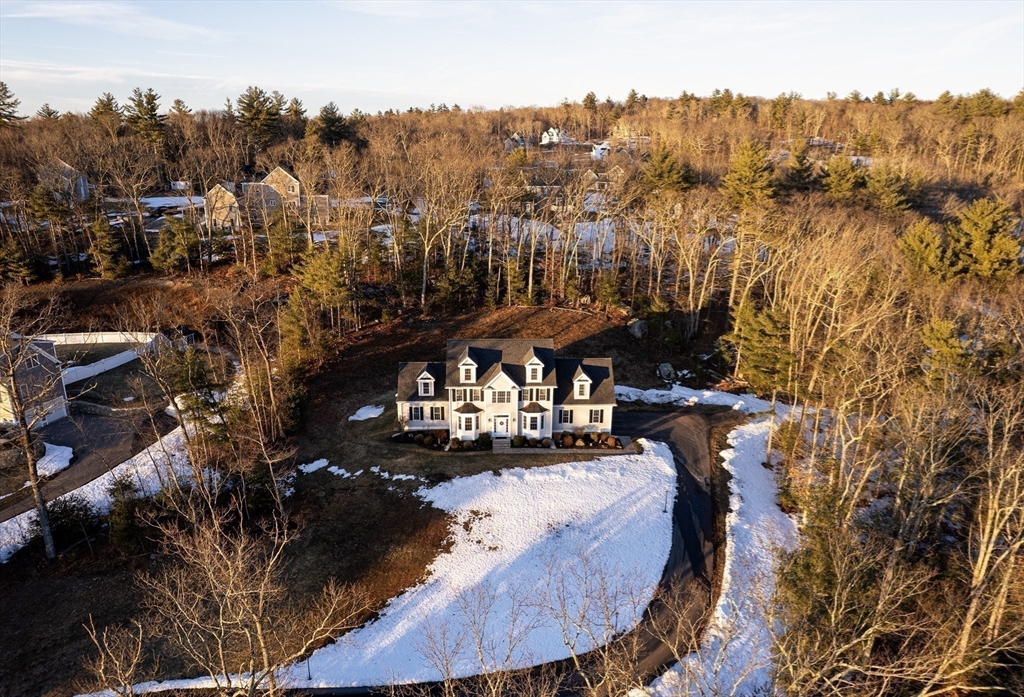 7 Jewell Crossing Mendon, MA 01756 - Photo 5 of 42 a view of a house with a yard from a fountain