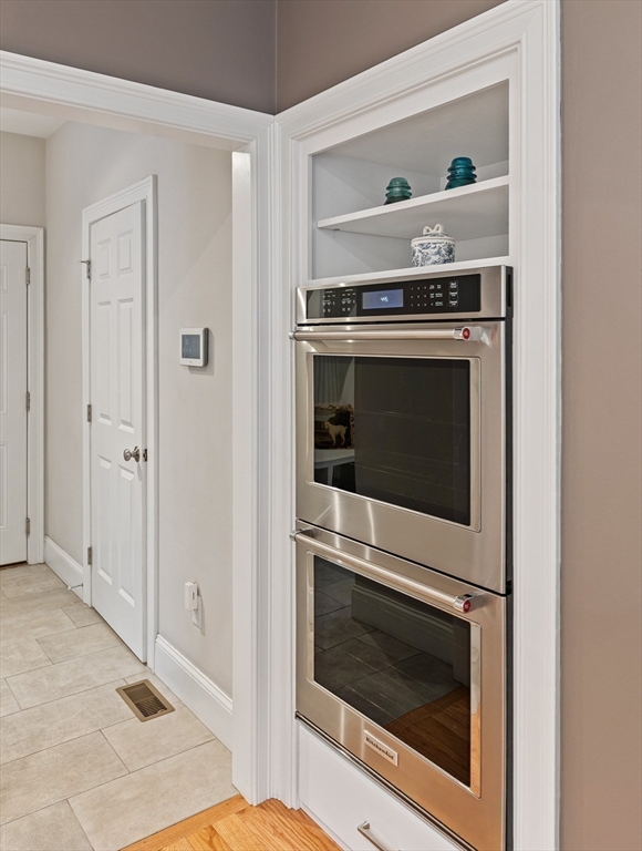 7 Jewell Crossing Mendon, MA 01756 - Photo 8 of 42 a stove top oven sitting inside of a kitchen