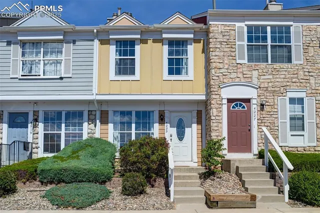 a front view of a house having yard