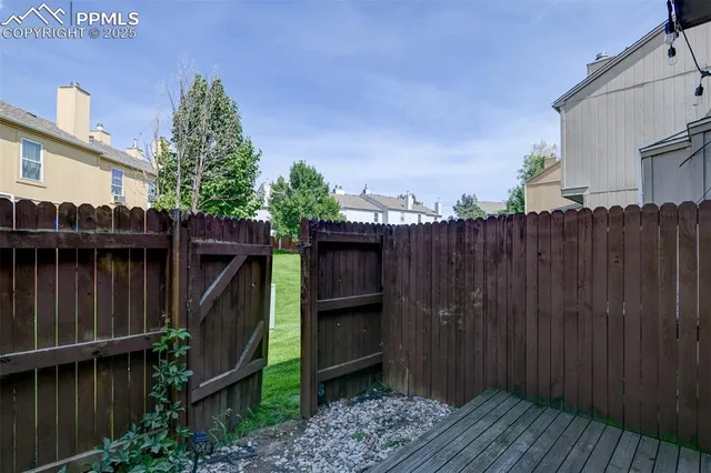 a house view with a backyard space