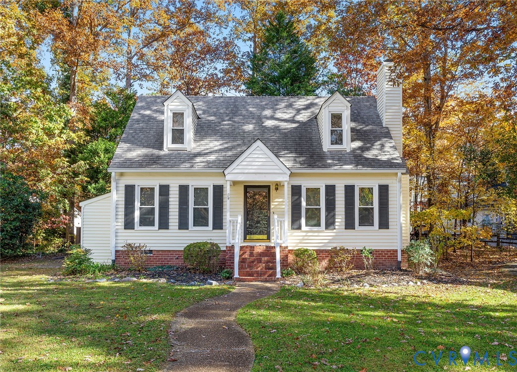 2411 Arrowood Road Midlothian, VA 23112 - Photo 1 of 34 front view of a house with a yard