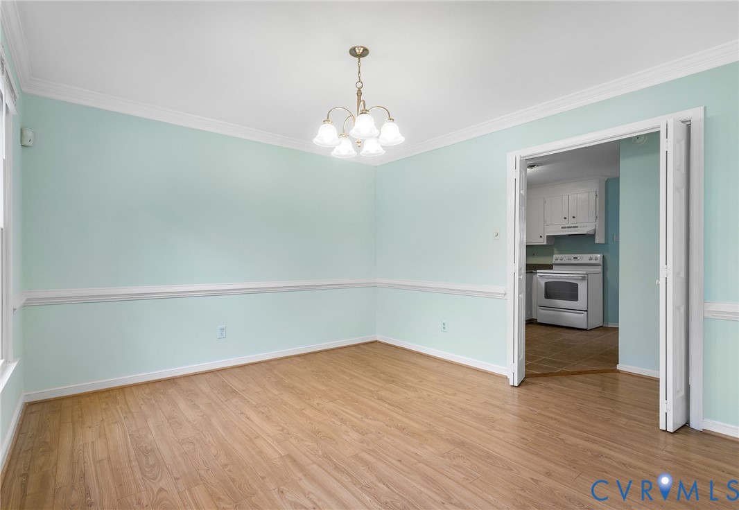 2411 Arrowood Road Midlothian, VA 23112 - Photo 12 of 34 a view of a kitchen with wooden floor and kitchen