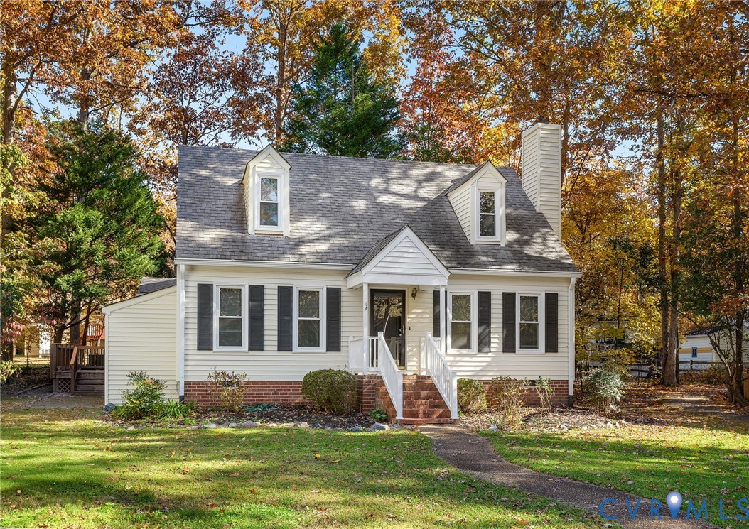 2411 Arrowood Road Midlothian, VA 23112 - Photo 2 of 34 a front view of a house with a yard
