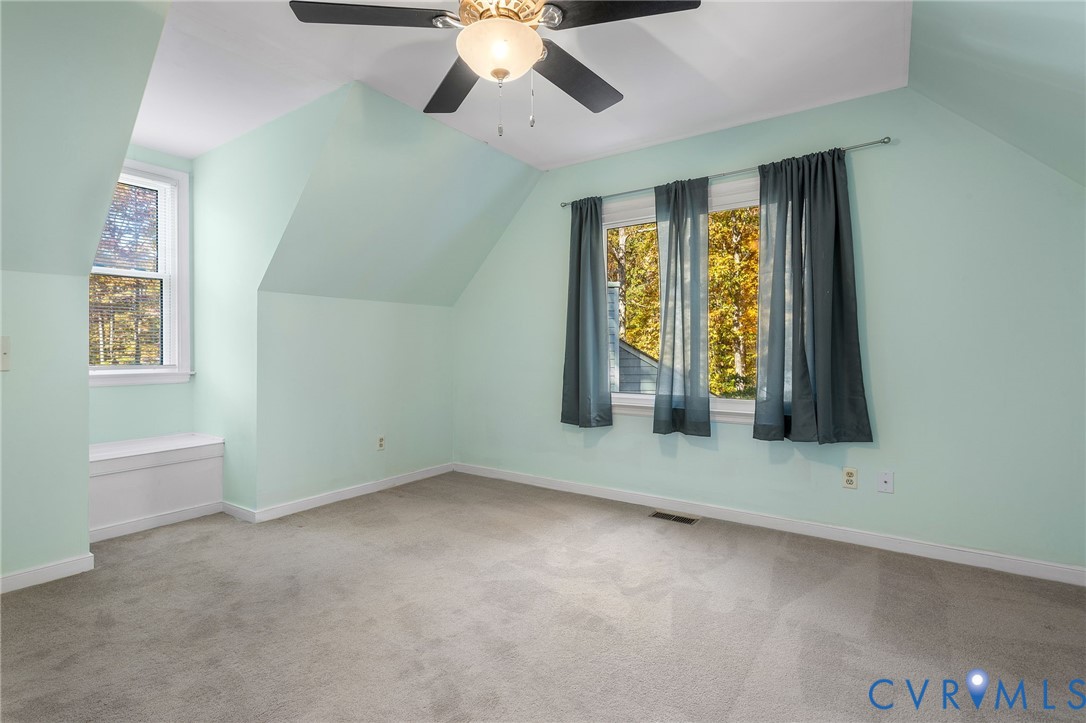 2411 Arrowood Road Midlothian, VA 23112 - Photo 21 of 34 an empty room with windows