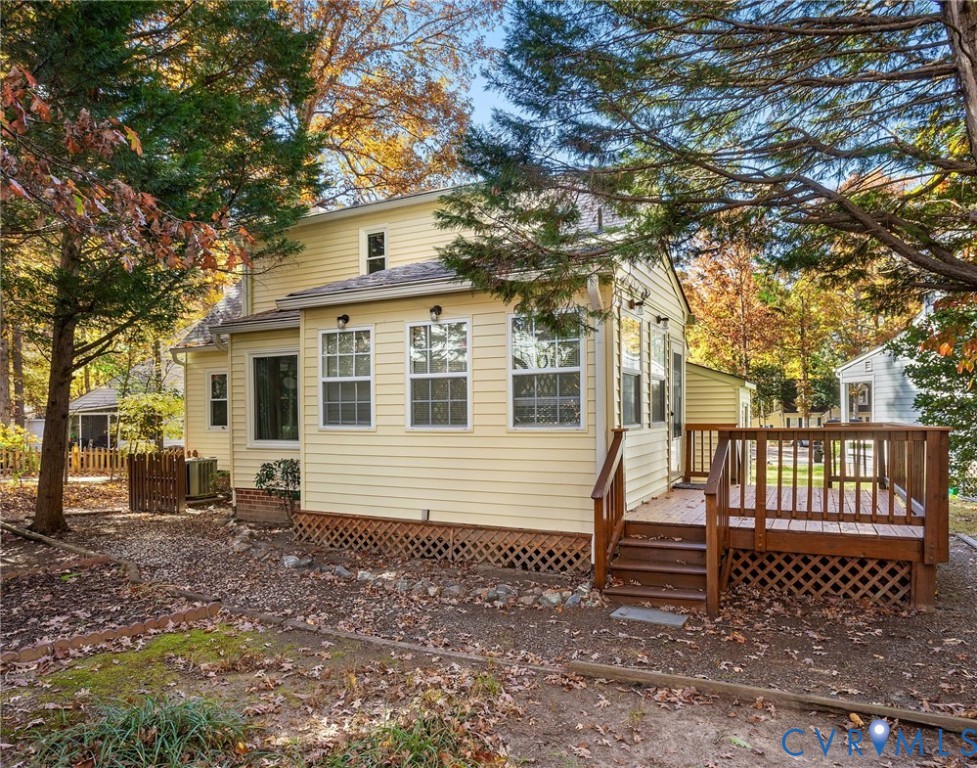 2411 Arrowood Road Midlothian, VA 23112 - Photo 26 of 34 a front view of a house with garden