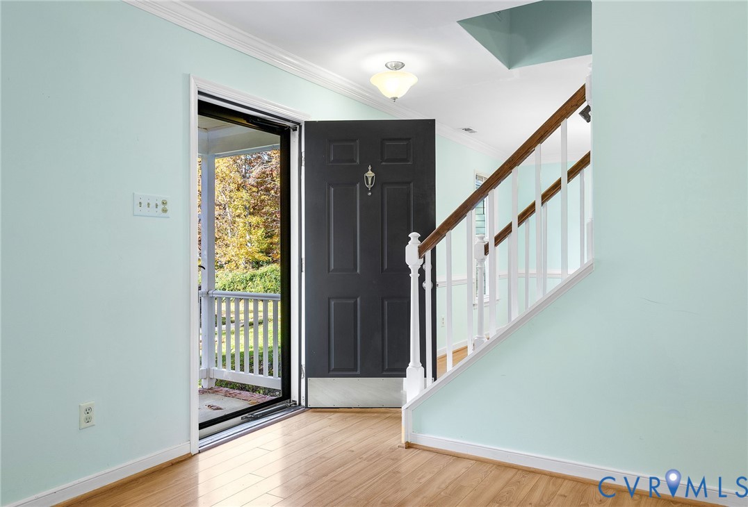 2411 Arrowood Road Midlothian, VA 23112 - Photo 4 of 34 a view of an entryway with wooden floor