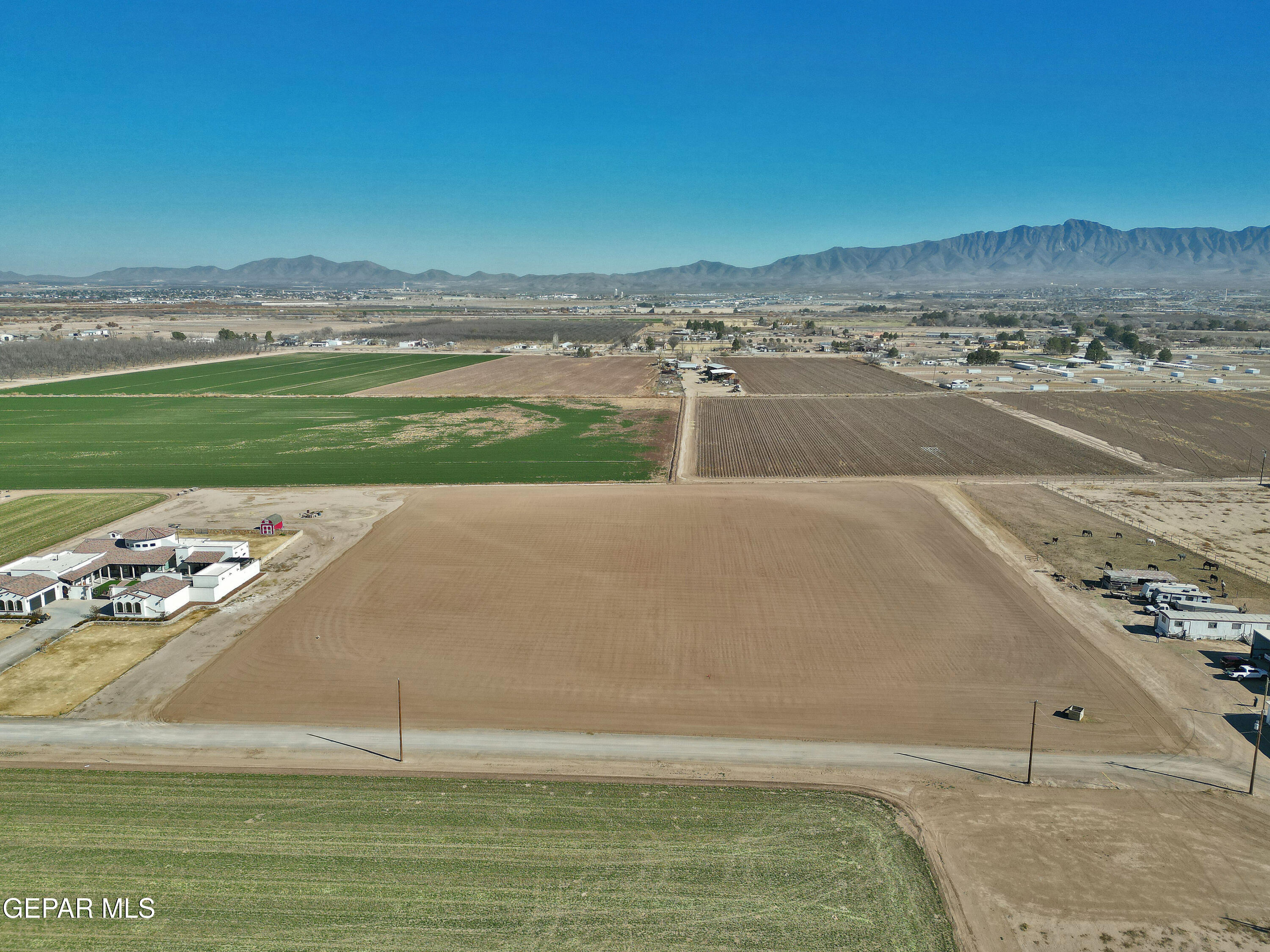 R1908646 Heavenly Lane Anthony, NM 88021 - Photo 14 of 15 a view of a swimming pool with a yard