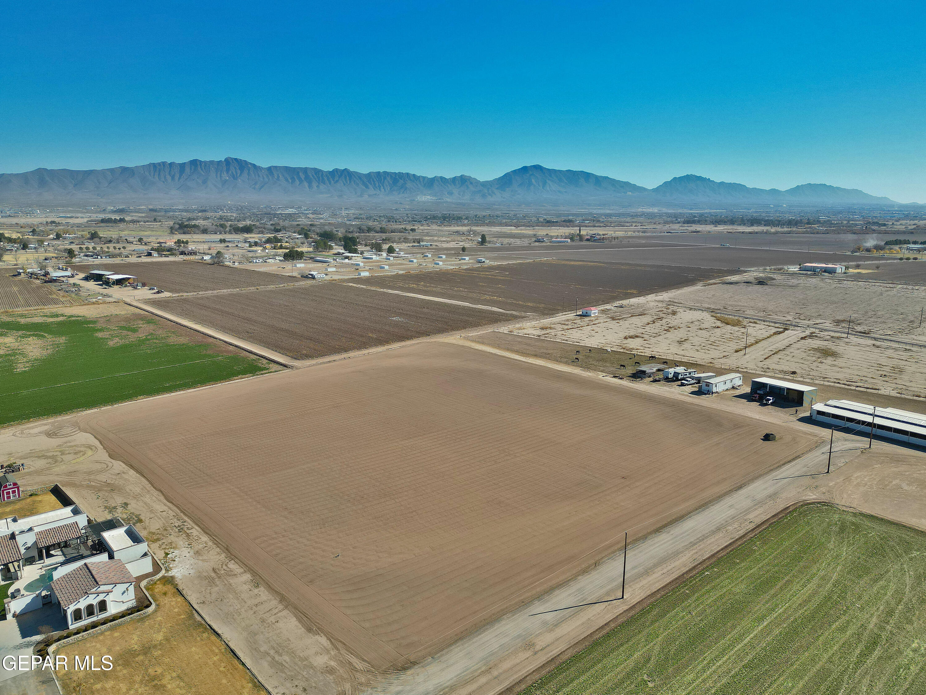 R1908646 Heavenly Lane Anthony, NM 88021 - Photo 3 of 15 a view of a lake with a mountain