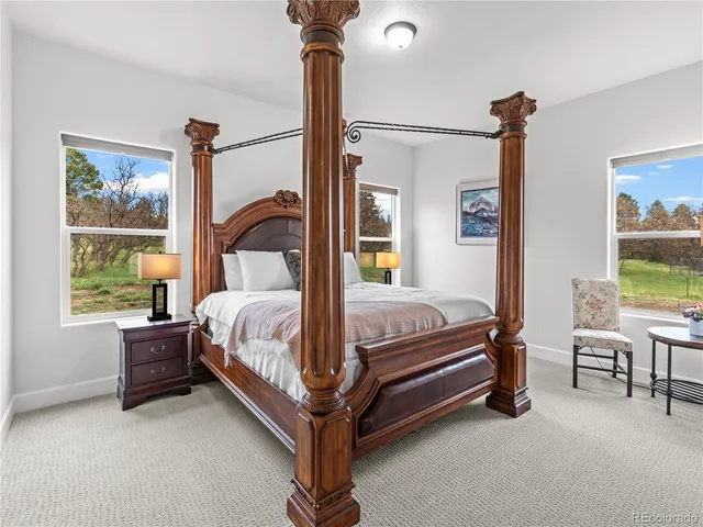 a bed room with a bed and a window