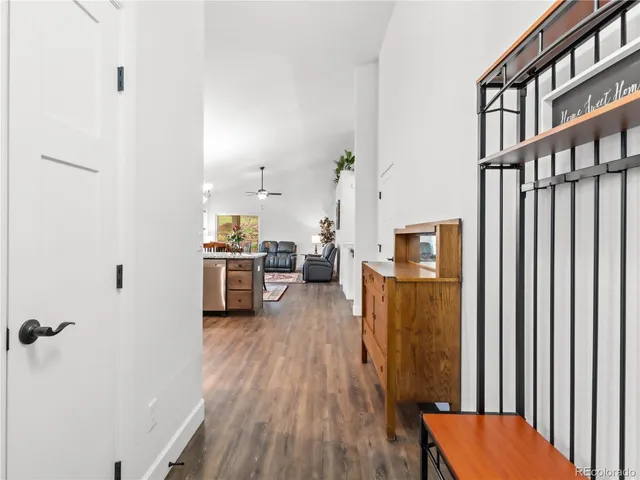 a view of a living room and hardwood floor