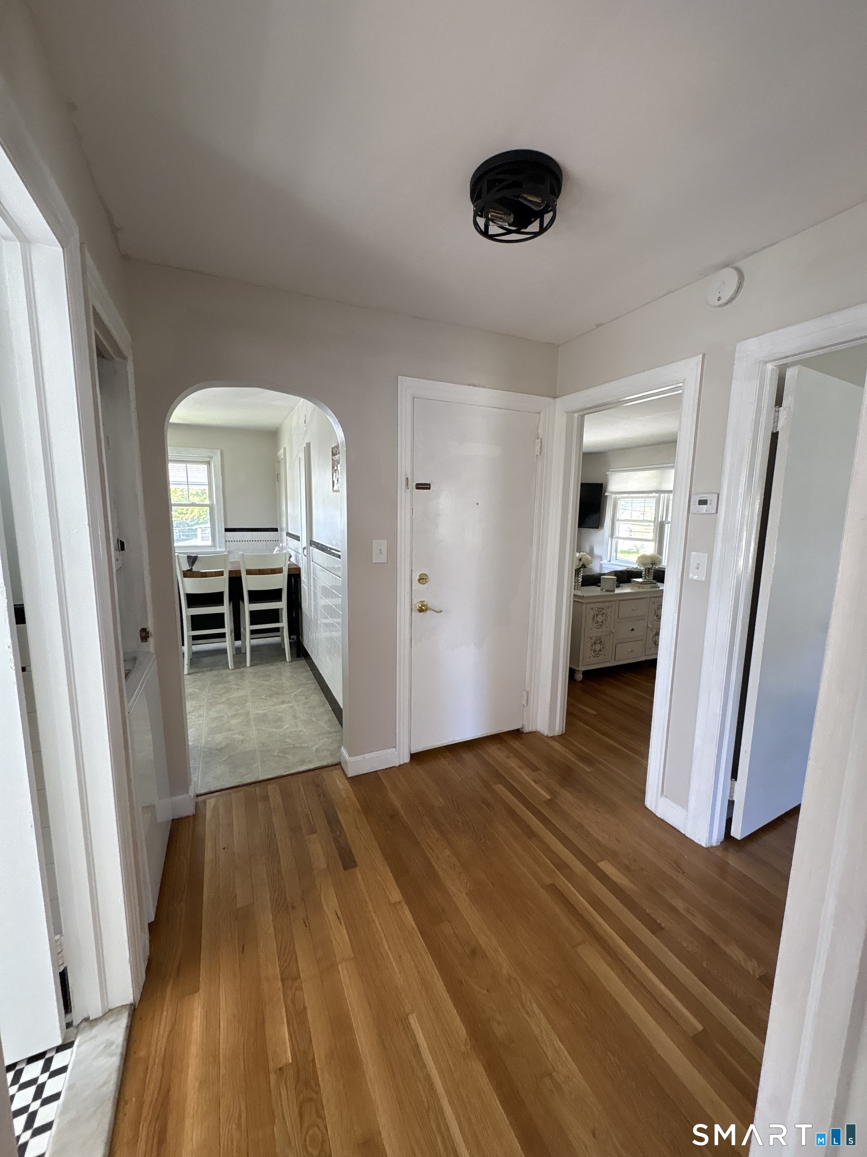 7 Rourke Avenue Southington, CT 06489 - Photo 4 of 7 a view of a livingroom with wooden floor and furniture