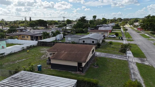 a view of a lake with a yard