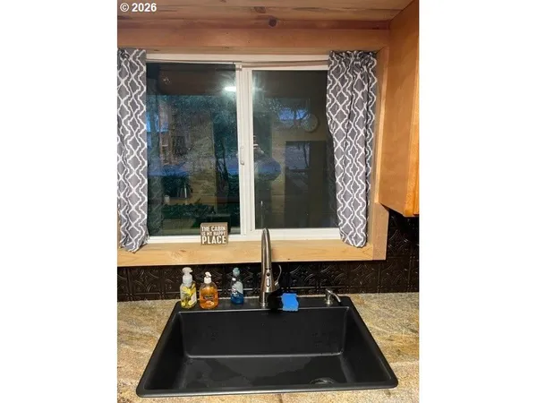 a room with table and chairs
