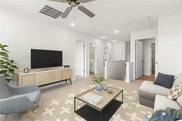 an empty room with a window and a ceiling fan