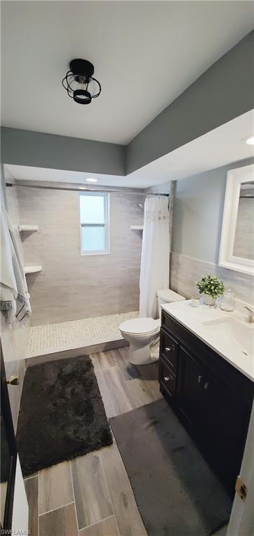 391 Torrey Pines Point Naples, FL 34113 - Photo 16 of 32 a bathroom with a sink and a mirror