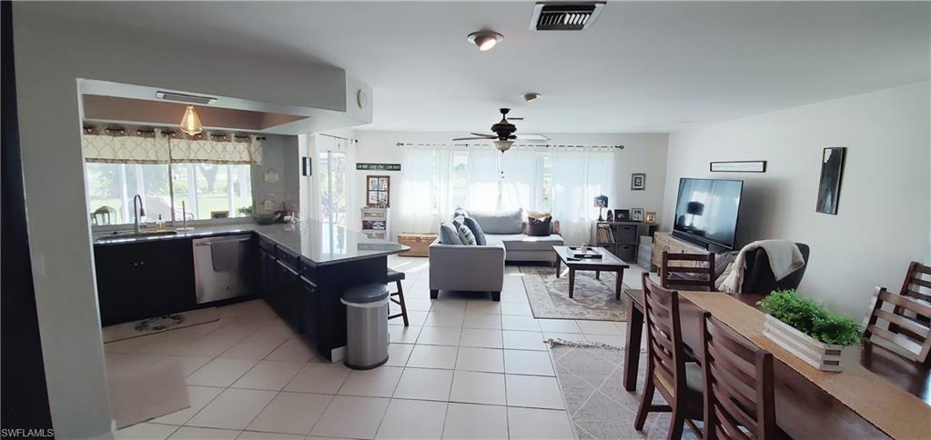 391 Torrey Pines Point Naples, FL 34113 - Photo 8 of 32 a living room with furniture