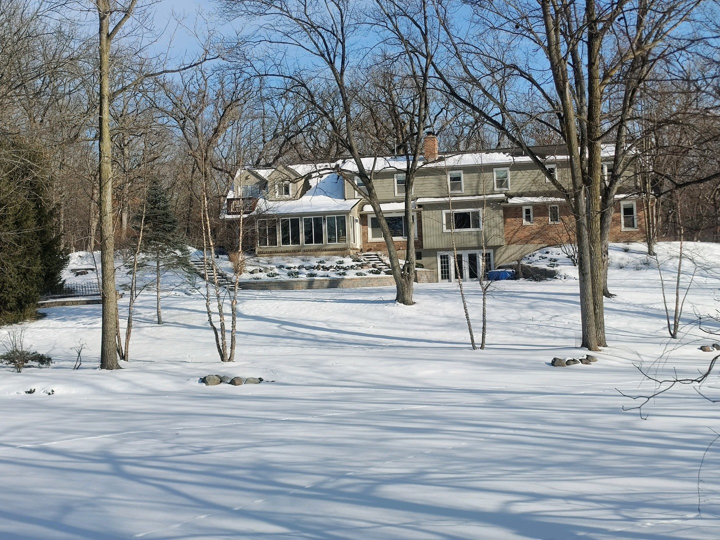 3143 Cuba Road Long Grove, IL 60047 - Photo 2 of 40 a front view of a building with street