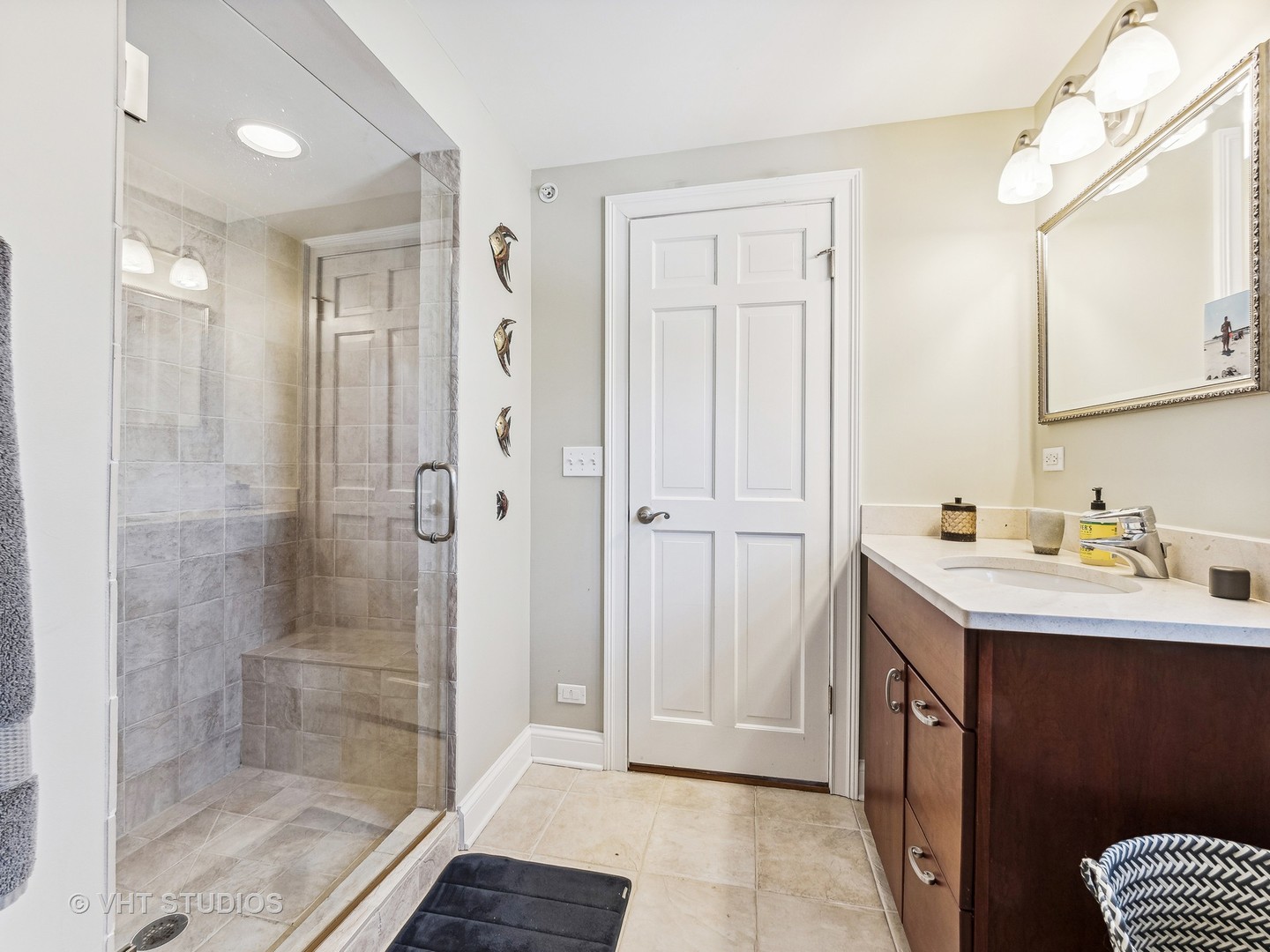 3143 Cuba Road Long Grove, IL 60047 - Photo 24 of 40 a bathroom with a shower sink and mirror