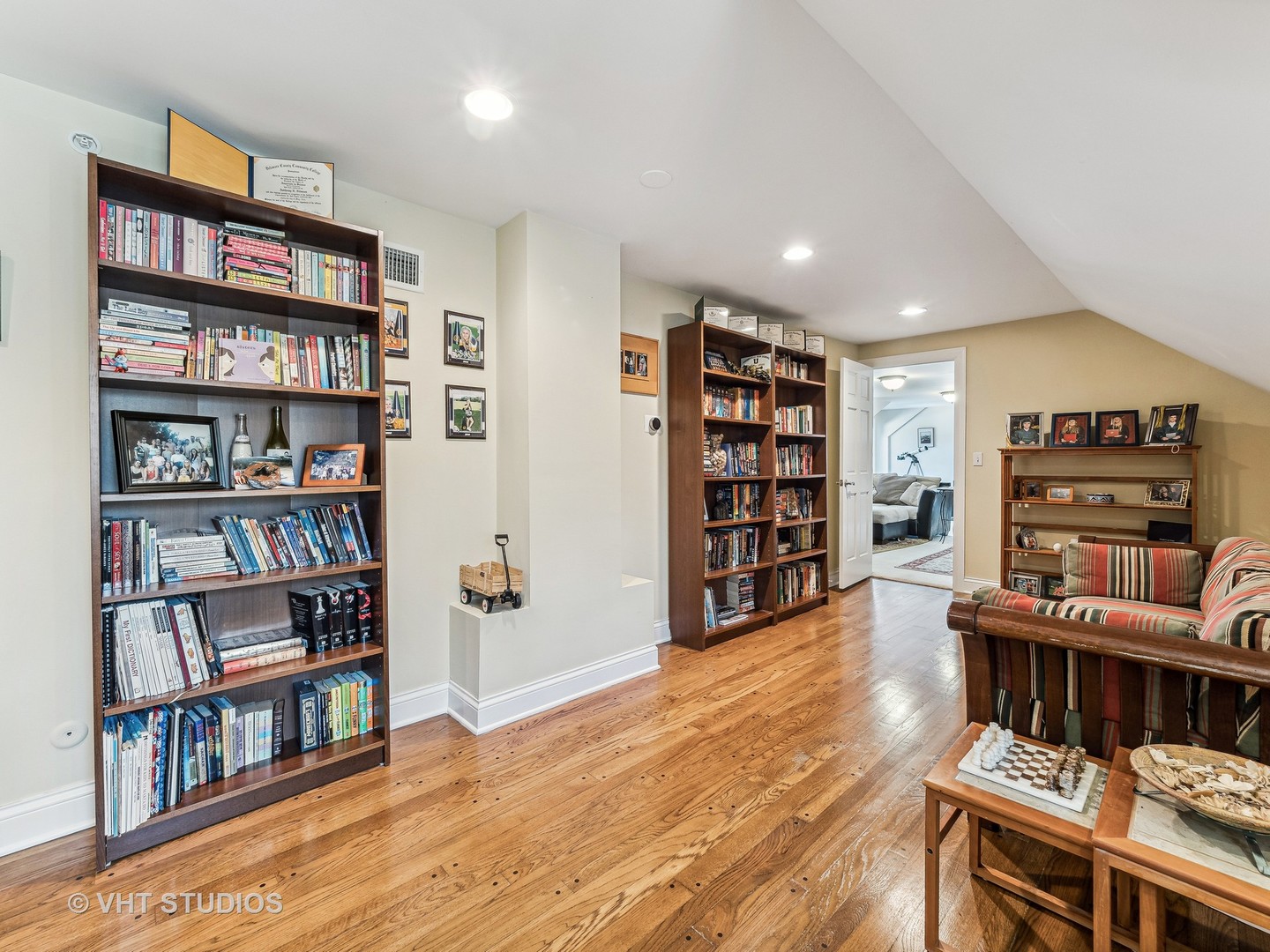 3143 Cuba Road Long Grove, IL 60047 - Photo 28 of 40 a living room with a book shelf and a book shelf