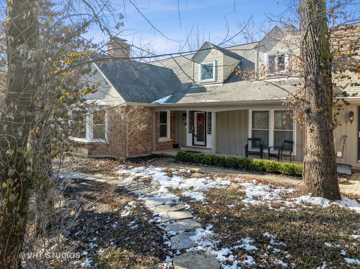 3143 Cuba Road Long Grove, IL 60047 - Photo 3 of 40 a front view of a house with a garden