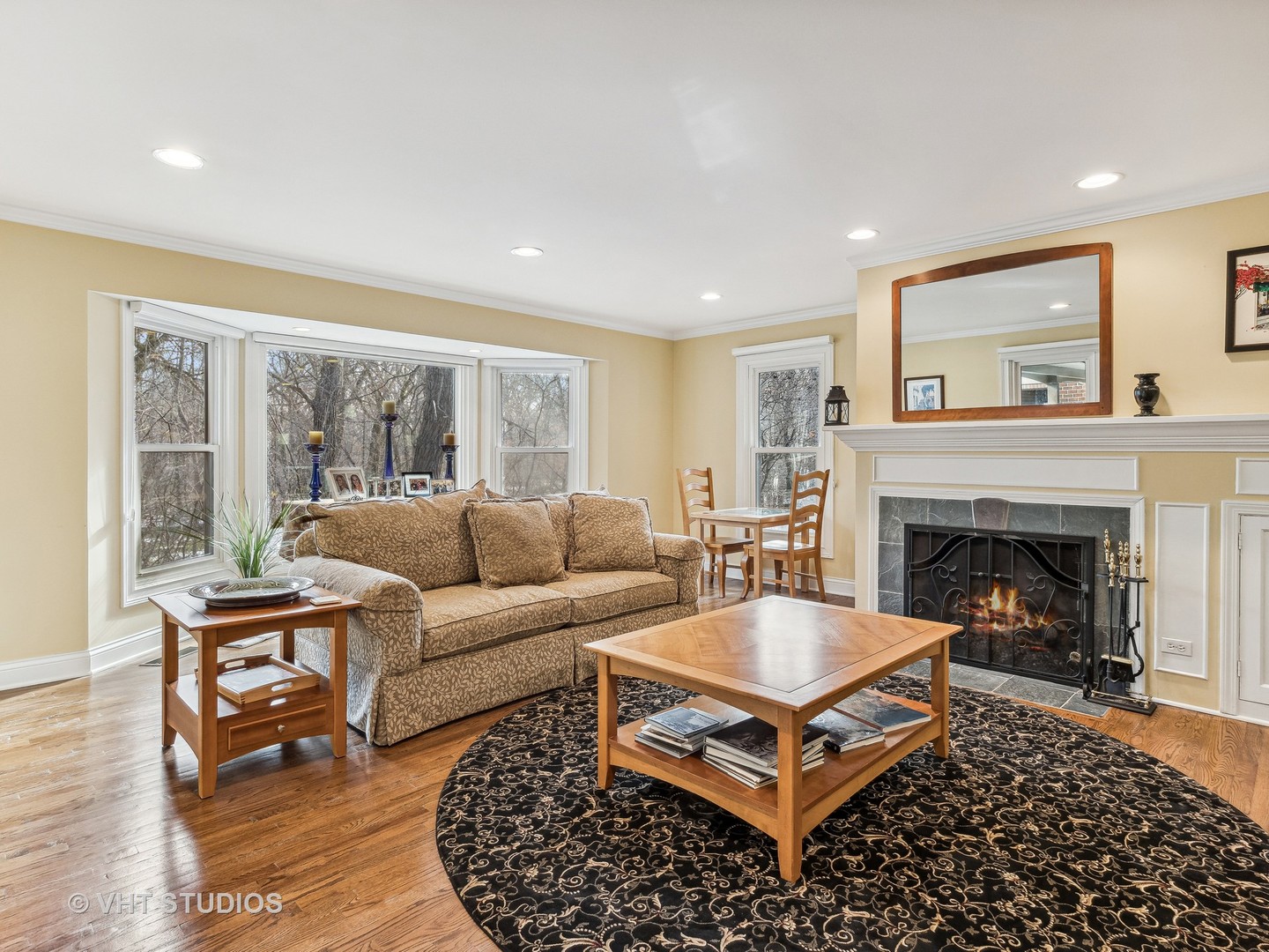 3143 Cuba Road Long Grove, IL 60047 - Photo 9 of 40 a living room with furniture a flat screen tv and a fireplace
