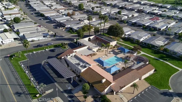 an aerial view of a house with outdoor space