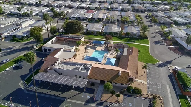 an aerial view of a house with a swimming pool outdoor seating yard and outdoor seating