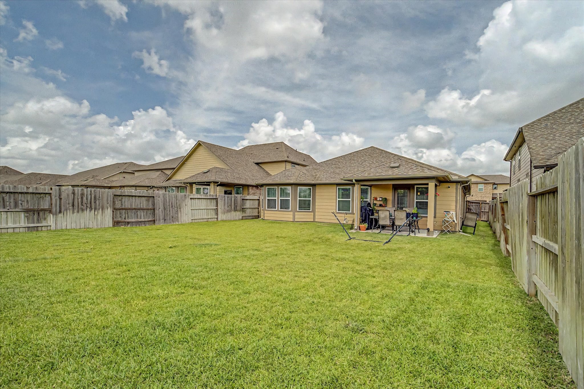 10842 Cliffs View Drive Iowa Colony, TX 77583 - Photo 40 of 47 Spacious backyard great for entertaining!