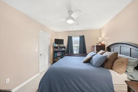 a kitchen with stainless steel appliances a refrigerator and a stove