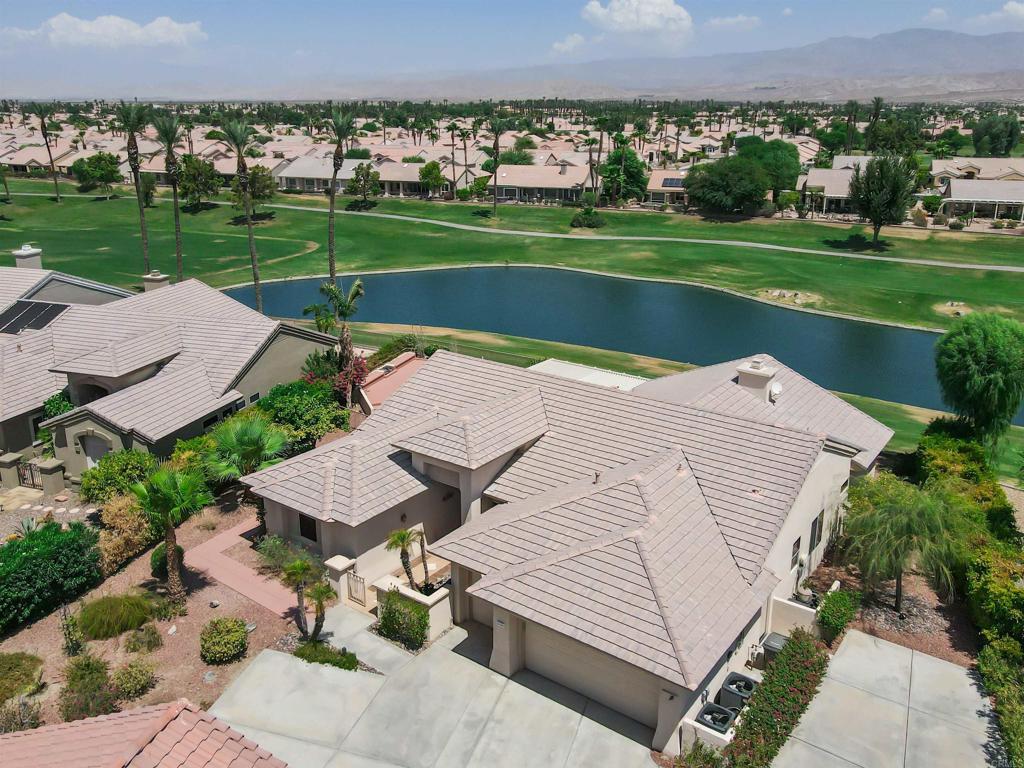 39303 Gleneagles Circle Palm Desert, CA 92211 - Photo 11 of 71 an aerial view of a house with a yard