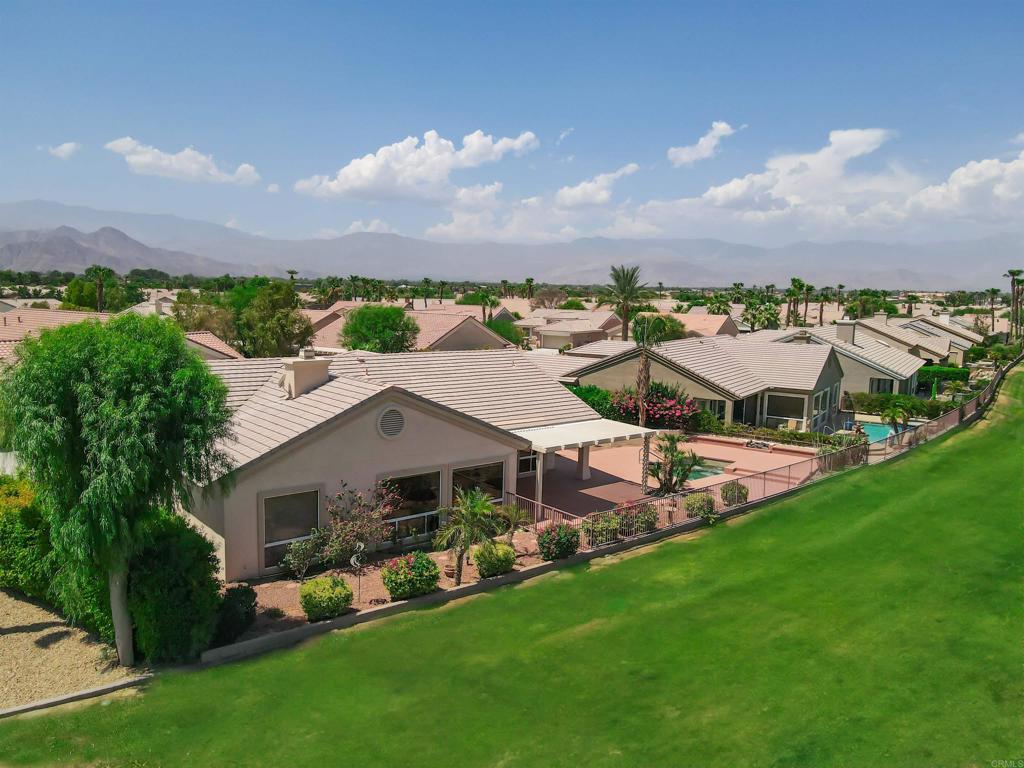 39303 Gleneagles Circle Palm Desert, CA 92211 - Photo 16 of 71 an aerial view of a house with a garden