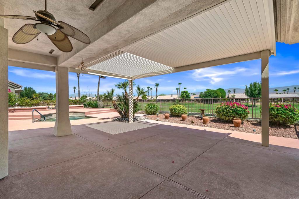 39303 Gleneagles Circle Palm Desert, CA 92211 - Photo 30 of 71 a view of a backyard
