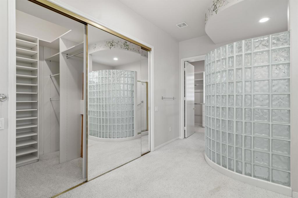 39303 Gleneagles Circle Palm Desert, CA 92211 - Photo 38 of 71 a bathroom with a shower and a glass door