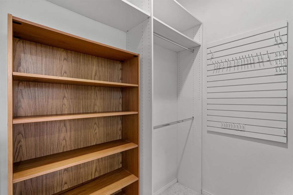 39303 Gleneagles Circle Palm Desert, CA 92211 - Photo 39 of 71 a view of walk in closet with empty racks