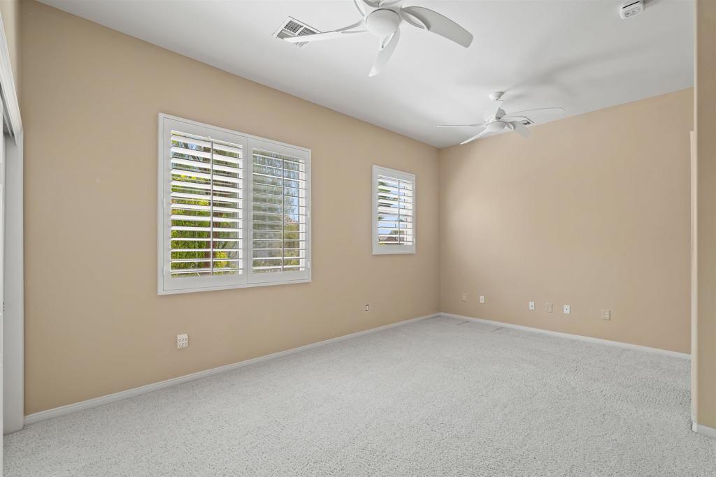 39303 Gleneagles Circle Palm Desert, CA 92211 - Photo 45 of 71 a view of an empty room with a window