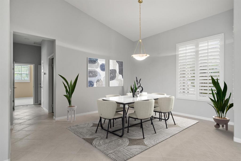 39303 Gleneagles Circle Palm Desert, CA 92211 - Photo 6 of 71 a view of a dining room with furniture window and wooden floor