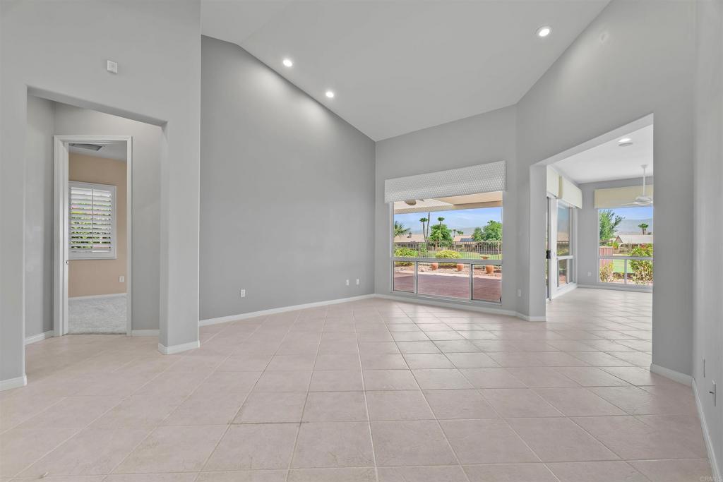 39303 Gleneagles Circle Palm Desert, CA 92211 - Photo 68 of 71 wooden floor in an empty room with a window