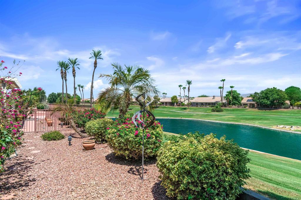 39303 Gleneagles Circle Palm Desert, CA 92211 - Photo 71 of 71 a view of a lake with a big yard